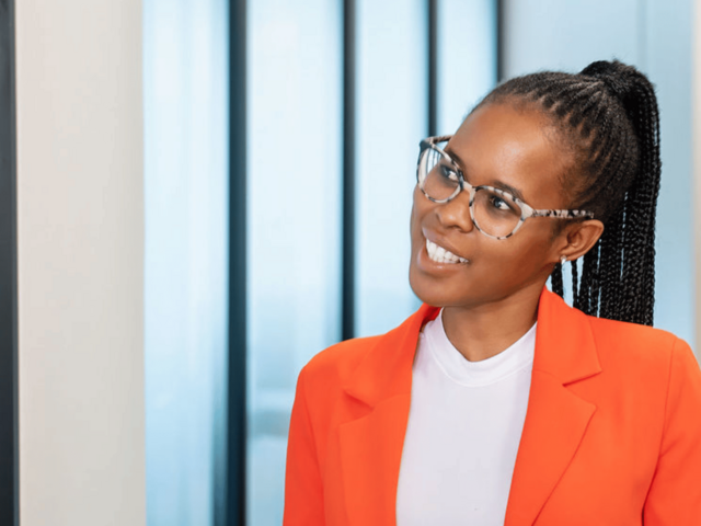Omolemo Maribe smiles happily at the camera.