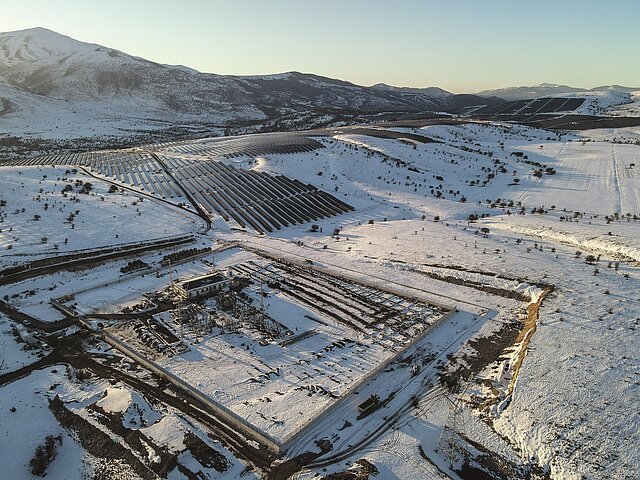 The PV powerplant in winter. SNow is building up on the panels.